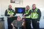 Accessible News founder Richard Jones with Inspector Robert Blunt, PCSO Ceri Price and PC Nick James