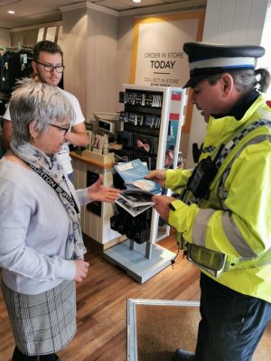 PCSO Ceri Price talking to shoppers in Aberdare about the Considerate Parking Campaign