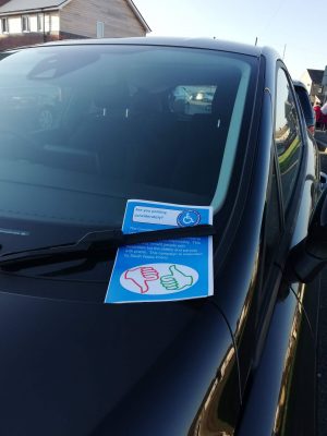 Considerate Parking flyer on a car windscreen